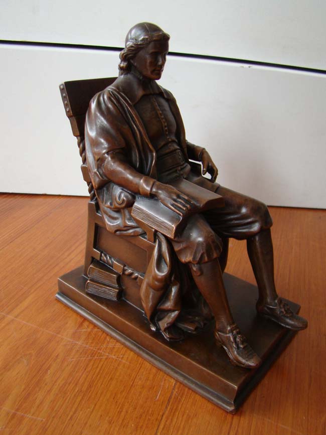 A fabulous 'mint' condition single bookend of JOHN HARVARD made by Jennings Brothers circa 1930